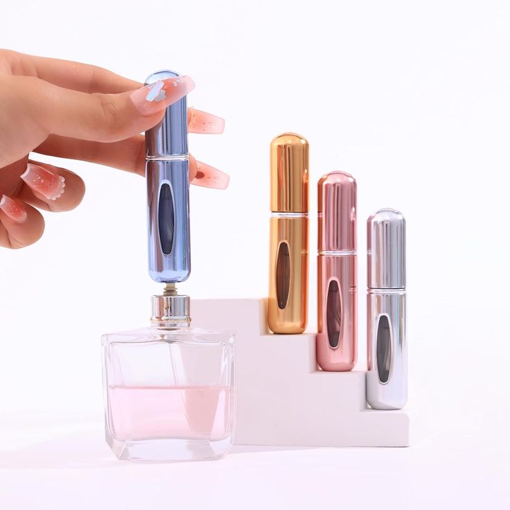 Portable Mini Refillable Perfume Bottle With Spray.